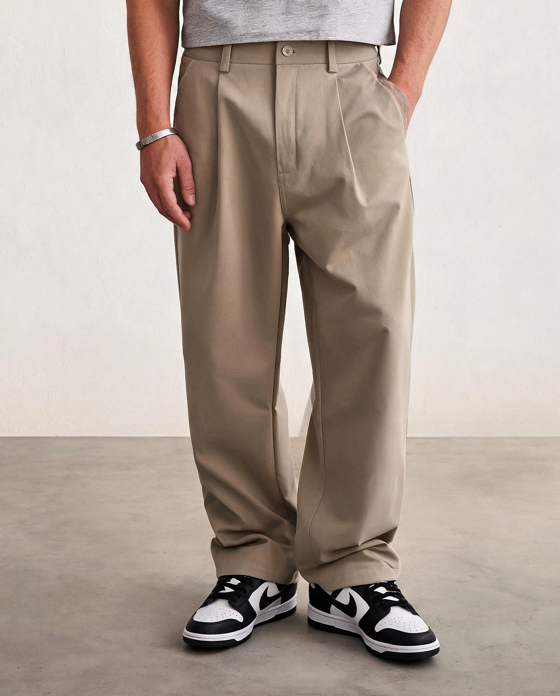 Hipland Pleated Cotton-Nylon Commuter Trousers Khaki front