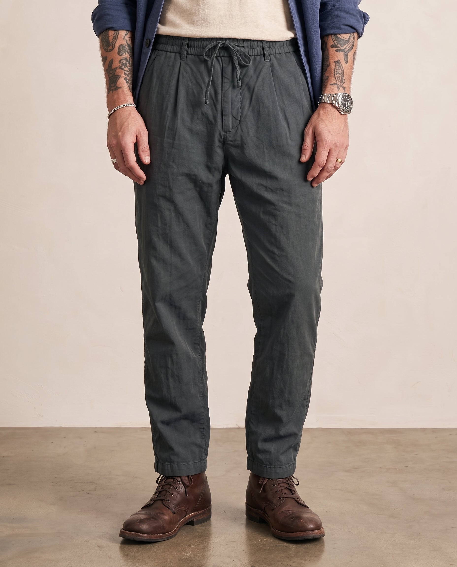 Hipland Pleated Lyocell-Nylon Trousers Deep Grey front