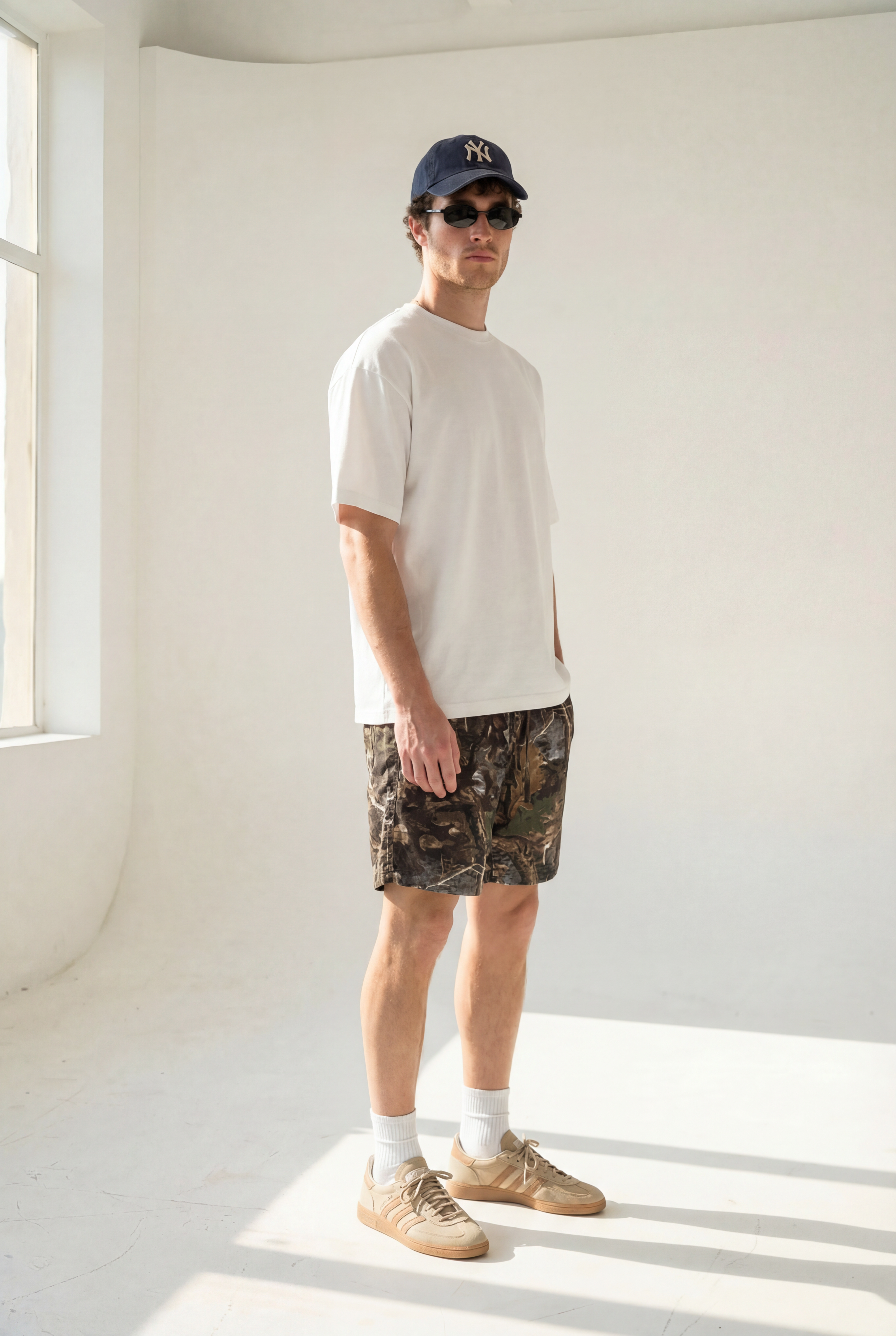 Hipland Bush Camo Shorts — Dark Camo — lifestyle view